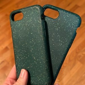Two Pela brand iPhone 7 dark green phone cases.